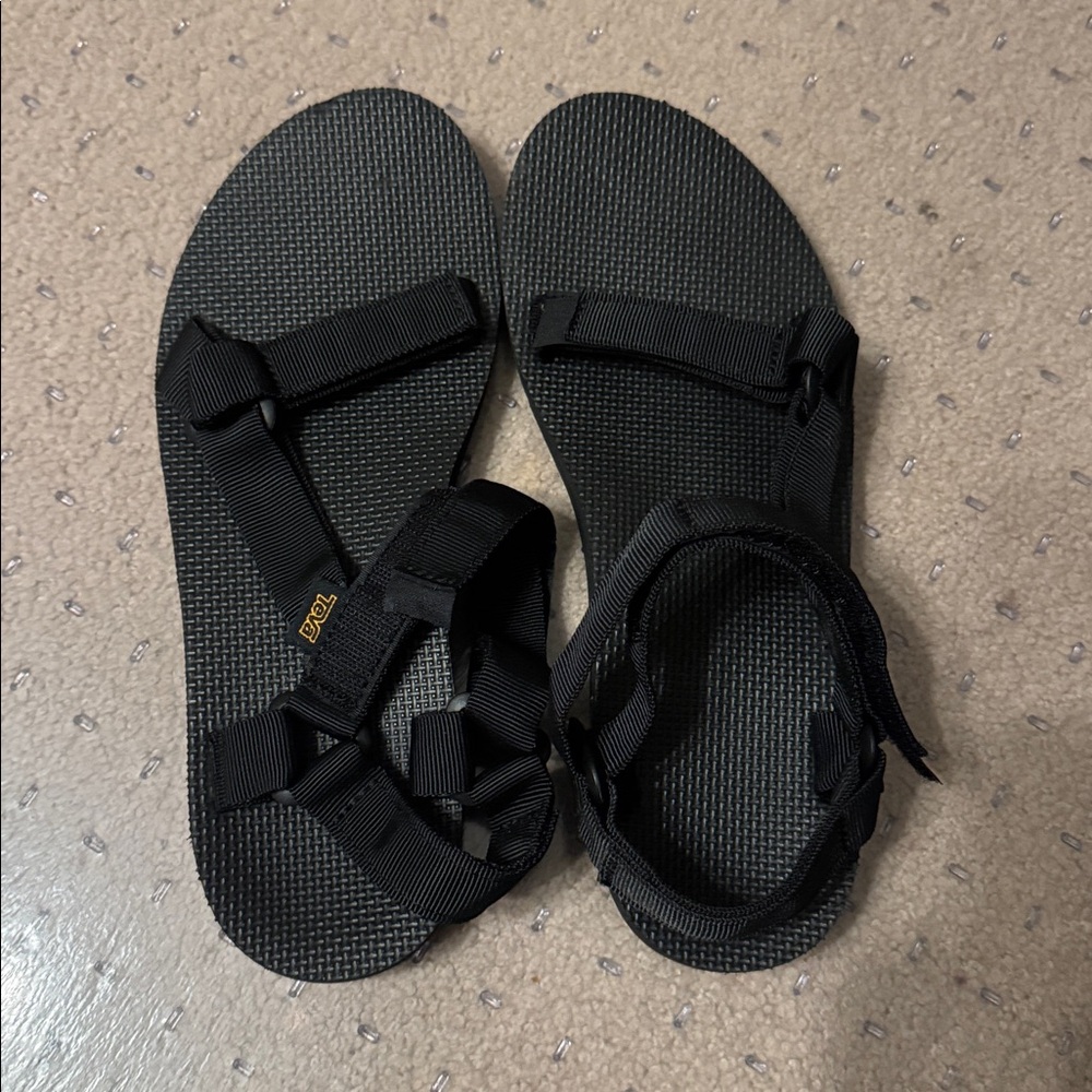 Teva Black Sandals with Gold Logo Flatform Universal Sandal